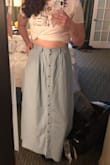 Absolutely beautiful! I love the color and the buttons running all the way up the front. It sits comfortably at my waist or it can be pulled up a bit higher. I love that it is long enough for how tall I am, maxi dresses/skirts often look like I am prepping for the flood. Love! - Cassedy C.