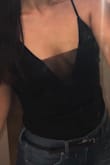 This tank top is a must have in your wardrobe. It is so cute and can be worn on its own or under a cardigan. I bought this in multiple colors and want to buy it in even more colors! I love it. - Milagro T.
