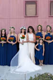 If you're looking for a bridesmaid dress, look no further. This is such an easy dress to wear and it's so beautiful! I know it comes in several colors. I love the high neckline and intricate back detail. I did have to get it hemmed to wear heels. - Rachel G.