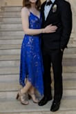 I wore this dress to a wedding and love the color and style! I ordered the XS and it ran pretty big. I was expecting the bodice piece to be form fitting, and it was very loose. Overall I love the dress. Getting it altered and will continue to wear. - Tori K.