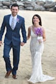 I wore this dress to my intimate beach wedding without shoes and it was absolutely perfect! It has a slim fit with a nice train. For me it was true to size. I usually am a XS/S and I got the dress in an XS with no issues. - Megan E.