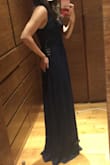 Lulus is always a win! The dress is just as pictured, it looks very elegant. The fabric is very nice; soft and flowy. It's a bit long, but nothing a simple hem can't solve. I would definitely buy it again. All my friends and family loved the dress! - Mabel D.