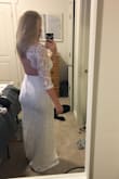 I wanted an affordable wedding dress that was simple and elegant. This dress met all of my expectations. I love the open back with the scalloped lace. It also fit like a glove and wasn't extremely long on me. I'm excited to wear this for my wedding in June and can't wait to show my fiance. I'll post pictures of the wedding when I get them done later this spring. - Michala O.