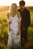 I chose this dress to wear for my engagement pictures and it is BEAUTIFUL! It fits true to size and is super comfortable. I am 5'9", so I am usually worried about length, but this dress was perfect! Would work perfectly for a bridal shower, photos, and even a wedding guest dress. - Halsey T.