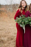 I wore this as a bridesmaids dress in December and the material is very thick and warm. The dress itself hugs your curves very much, but the high neck makes it a classy gown. It is stretchy and I absolutely love this dress. - Katherine B.