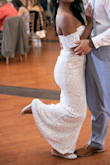 I ordered this dress as my 2nd wedding dress to be more comfortable during my reception. It fit very nicely. Alterations: I had to hem the bottom and the zipper in the back would bunch up so my seamstress had to do something there too. I added off-the-shoulder sleeves to achieve the look I wanted. Overall, a very comfortable dress with beautiful sequins/beading detailed designed. - Pam J.