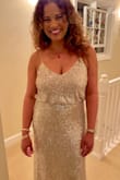 I wore this dress to a big New Year's Eve party. The dress looked so pretty on. I received tons of compliments which I didn't expect because of the simple design. I ordered the medium, but I think the small would have worked as well. I had to have it taken in a couple of inches. The dress is also very long, so if you are short like me you'll have to have it hemmed. - Alaida M.