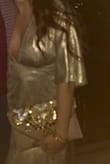 Loved this bag for an event! Looks so intricate and classy for the money. Just a heads up: there's a chain inside so you can wear like a purse. I went all NYE holding it like a clutch- champagne in one hand, clutch in the other... didn't realize the chain until I was a few glasses in. Would've been helpful to have realized sooner LOL 

Anyways, buy this. It's cute. - Alexandria N.