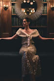 I actually ordered this dress for my winter wedding last minute because I wasn't satisfied with the dress I originally had. It arrived quickly and when I put it on, I knew it was the right choice. It's old Hollywood glam and fits like a glove while being forgiving. It's certainly a statement, so you need an occasion to wear it, but sequins are so trendy right now and the color isn't a "boom in your face" bright metallic, it's more of a subtle champagne/silver twinkle. The only thing I personally don't find super comfortable is spaghetti straps, so I paired it with a faux fur shawl to balance out the minimal fabric on top. It was perfect for the price, super comfortable, and a real stunner. So glad it was available and got to me quickly in time! - Betsy B.