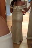 This dress has nice, thicker fabric. It fits like a glove for a sexier style as it fit around my waist and curves perfectly. I tried it on for a wedding dress, but I ended up going with another ivory option. It's a great option for someone looking for a blank canvas to accessorize with. - Ashley P.