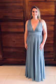 This was my first purchase on Lulus and I was VERY happy with the fit! I wore this dress to a wedding and I was a bridesmaid. According to my measurments and the sizing scale, they recommended a XL but with the pictures provided from other customers, I was sure the L would fit (L is my usual size in dresses). The material and colour is exactly what it looks like in the picture (as advertized). The dress itself is so well made too - there's even little transparent rubber rectangles where the dress hits the shoulders to keep the straps from falling down (and they worked). I also liked that the slit was not too much and did not show unless I popped my leg out. I highly recommend this dress! - Kariane B.