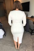 I ordered both a medium and large and while the medium fit the large was smoother and more flattering on me. I wore spanx with a corset under and you can see the zipper down the middle, but it is better than seeing rolls lol. I'm short but didn't need to alter the length, I have a very large chest and fit both the medium and the large. Even though the parts of the spanx showed through, I still felt the dress was well lined. I did wear a bra though because you could just barely see the color of my nipple and figured that would be worse in the sunlight. I thought the quality was superior for the price too. - Amanda R.