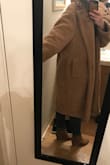 As other reviewers have said, the coat is fairly large. From certain angles it's not super flattering, but overall I'm happy with the oversized fit. The material isn't itchy, and the liner feels high quality. Most importantly, the coat is INCREDIBLY warm! It's like wearing a cozy blanket. - Raelyn T.