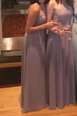 Had to have the straps shortened a bit and about an inch off of the bottom. Some girls had cups added to the dress, but I wore stickies and they were not noticeable at all. Very comfortable and looks good with any skin tone. - Julia C.
