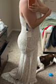 Bought for my courthouse wedding. I fell in love with it online, and when I tried it on! It's very flattering, and I love the small train. - Melanie W.