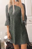 High quality, comfortable and perfect length but, it runs a little looser around the waist area. Love the sleeves and the color, but wish it was more fitting. - Maggie A.