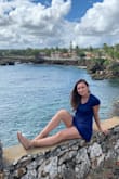 I purchased this dress for my trip to the Dominican Republic and I am SO happy I did! Even though it was a bit breezy, I didn't have problems with it blowing up, I also wore a bathing suit under it so I wouldn't have worried too much if it had. It was so comfortable, the material is soft, it looked super cute and matched the suit I wore under it perfectly! I highly recommend buying this dress and I will be buying every color for the summer! Trust me, you won't regret it! - Maria H.