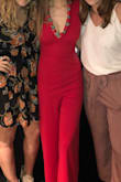 I got this jumpsuit to wear to my graduation party. It fits so well and gives my body such a nice shape! I was afraid the neck would be too plunging, but it's perfect. The torso is a bit long so if you're shorter than me that might be something to think about. Regardless, I love it so much! - Peyton M.