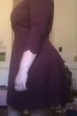 This dress has a nice thick, stretchy material, but was a little darker in color than expected. I ordered a size up after reading everyone else's reviews and I'm really glad I did. It is the perfect length and can be dressed up and down with different accessories. If you have a larger bottom half I wouldn't worry about sizing up, but if you have a larger chest I definitely suggest it! - Kierstan M.