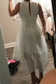 Good fit... ordered a small and I probably cold have went into an XS but the small was okay. Used this for wedding pictures and my elopement. Good fabric and didn't need to wear a bra, which was a plus in my book. The outer layer added a little more "puff" than I would have liked as it accentuated my hips but other than that, the fit was good. - Ashlee J.