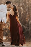 This dress is absolutely gorgeous! I loved the slit and the ruffles on the dress! I wore it for my engagement shoot. It is a beautiful
Color as well. I would definitely wear it to other events as well. - Briana M.