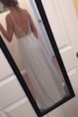 I would have ordered a 0 if it had been an option. I'm going to see if I can have the straps and waist taken in without completely destroying the beading, if not I'll return. Wish they'd offer in a 0 to begin with. But overall it's pretty nice quality and fun. I plan to wear it as a reception dress. And yes obviously unless you're 6 feet tall, it'll need to be hemmed. And the skirt is a little sheer, so wear nude undies. - Kelsey M.
