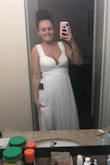 This dress is beautiful in person. It did not look the way I wanted it to on me, as is. I am having the sleeves sewn up different. I thought I would like those sleeves, but I didn't. Personal preference, that's the only reason. Bra area is very supportive!! And it's very slimming. I didn't have anyone to take pics, so I'll show you the awkward weird selfies lol. - Heather E.