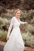 Bought the size Medium at first and it was way to big and gaped a lot at the armpits when I would lift my arms. Then I exchanged it for a Small. The length is a little short now, but that is all right. The material is great quality for such a inexpensive dress.
Loved it! - Meghan S.