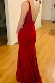 The dress fits perfectly! I can't wait to wear it to my medical school ball. I was nervous about the sizing because sometimes smalls can run snug on me but this was a true fit. I'm standing on my tip-toes in the pic so I'll be able to wear heels with plenty of extra length. No bra necessary if you're small-chested like I am. The fabric is a little on the thinner side but quality is still pretty good (as expected for the great price). Thanks Lulus!! - Caroline L.
