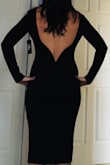 Standing up, the dress looks and feels great. Sitting down, the front of the dress sits tight on the front of your neck and slides off your shoulders. I'm normally a size 4 but ordered a medium so it wouldn't be too tight. It hugs your curves well but the shoulders need to come back more to avoid slipping and the neckline needs to scoop more to avoid choking. Plus every time you walk or sit, the dress rides up, so you have to pull it back down for a smooth appearance again. The material is comfortable. - Melissa H.
