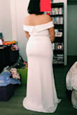 I LOVE the quality and fit of this dress. I tried on a similar style at a bridal shop that cost $800 and honestly, the difference wasn't much. I'm very wide around my hips and butt so the fabric in this dress stretched out and was a bit see-through around that area. However, I put on some shapewear and it smoothed out most of the lumps. I will also need to get it tailored because it was long on me. The fabric wasn't as soft and creamy as a high end bridal gown but the quality of the entire dress is amazing for the price. Also, love, love, love how flattering the off the shoulder neckline is! I would definitely consider this a dupe for that $800 gown! - Stacey A.