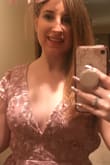 This dress is so pretty! The detail in the roses is gorgeous! Because it is backless, there is a little extra fabric on the sides that going down a size did not fix. You can see the extra fabric in the close up pic I shared. I got so many compliments on this dress! Go with the size closest to you. I went up because I was borderline between small & medium & ended up with the small. - Kelsey R.