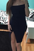 Absolutely love this dress!! I was in-between sizes S and XS and ordered a S because although my measurements fell toward XS, my normal dress sizing is usually a 2-4. It did end up being too big, so I returned it and got an XS and it fit perfectly!! I wore it to a school dance and it was so comfortable all night. I got so many compliments on it being simple, and classy! It's a gorgeous blue, wonderful & good quality material,  and the slit was the perfect height! My only comments would be: you do have to make sure to pull it down after sitting (like most dresses) but the slit can rotate a little if you're not paying attention! And the other thing is that upward arm movement is slightly limited, but that is expected with any off-the-shoulder dress! Neither of those things bothered me and I absolutely loved this dress!!! - Sarah W.