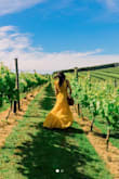 I get compliments on this dress every time I wear it! It's a great flowy summer dress, with a slit on one side and an open back. I've found so many reasons to wear it - on vacation, summer date nights, events, etc. You won't regret purchasing! - Marianne B.