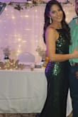 I received lots of compliments in this dress. It was nice and elegant. I wore it for my brothers wedding. It was not overly bright or sparkly. - Adilene A.