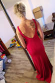 I love it! Great color, great quality, it's got some weight to it to show it's a quality material but still very light to wear. Fits in all the right places. It has a sort of underwire type piece that holds the bust area together in case you were concerned about it being too "vavoom". I am really impressed. I bought it to wear in my wedding engagement video. - Kaitlyn S.