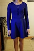 I love this dress. It was very comfortable and fit perfectly. The material is nice and kept me warm while waiting outside in 20 degree weather. - Mara W.