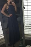 I just ordered this dress for my junior prom. I absolutely love the color and the fit. The dress is tricky to get on and off, but it's worth it. The material is light which makes it easy to move. The only thing was it was really long. I wore heels and it made it the perfect length! - Caitlyn B.