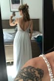 YOU CAN'T BEAT THIS DRESS FOR THE PRICE!!! Seriously. I bought this dress b/c my actual wedding dress was in alterations and after my second fitting (and $350 later), I was really nervous about how it was fitting. I bought this one as a backup. Fortunately, my original wedding dress came back and is looking good, so there is no need to keep this. BUT. Had I had known about this dress earlier on in the dress hunt, I would have 100% gotten this dress. Aside from being a little long even with 1.5" heels on, it fit perfectly and was super flattering. I'm actually sad to be returning it, but just don't have a need for it. - Danielle F.