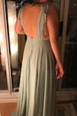 Absolutely beautiful dress! Really glad I read the reviews because normally I'm a medium but a small fit me perfectly. So if you're planning on getting this dress, order a size down from your normal size!! Some side notes... I will have to get it hemmed as it's super long - even with 4 inch heels, it's still too long for little ol' me. The shoulder are also a bit loose so I will have to get those adjusted as well. The waist itself a snug fit, but stretches a that's okay. Overall a lovely dress! 100% recommend. - Paula M.