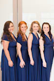 When my bridesmaids tried on this dress, they were immediately SOLD on it. So versatile, flattering, and comfortable. My bridesmaids were many different heights and sizes, but they all looked amazing in the dress. One bridesmaid did opt to have a stitch put in to ensure her chest would stay covered. The others did not need to do this. With so many ways to wear it, everyone was happy and comfortable enough to dance all night! - Ali J.