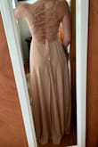 I'm a bridesmaid in a friends wedding. The bride wanted the bridesmaids in different shades of blush/pale pinks. At first I thought the photo looked a little on the peach side but I saw some customer review pictures and decided to give it a go. The color is perfect! I love the detail of the back of the dress. And for the price, I couldn't say no. The best part was the free shipping! I live on one of the Hawaiian islands and was worried about how long it would take to arrive. It was here within 5 days!  It is on the longer side. Usually I worry about dresses being too short when I order them online. I'm wearing 3 inch heels in the picture. - Melanie K.
