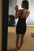 Sexy and modern. Material is forgiving and fits like a glove. I can't wait to wear this dress! The zipper gets caught a bit close to the top so I will have to be careful with it. - Nikki C.