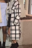 Super cute coat! Very comfortable, this was not at all itchy. It kept me warm but it did fit very long and big. Not as noticeable when buttoned and tied, wish they had it in an xs. - Ariana R.