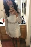 I would order a size smaller. I usually wear a size 6 or 8, so I thought medium would fit perfectly. This is definitely loose in the bust and hip area. I love the material, sleeved and neck line. Excited to wear for my bachelorette! - Cassandra J.
