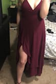 This dress is perfect for the wedding I'm in over the summer. The fabric is light and flowy. It's a little tight in the waist, and the lace up part slips down a little, but it still looks really good on! A large would have been way too big. I love the slit! - Jessica G.