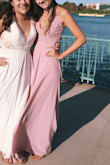 I wore this dress to my junior prom. It has always been a struggle to find dresses that fit my body well and this dress fit me perfectly! I am fairly tall and have a small chest. This dress was so beautiful and so flattering. The color is even better in person. 
Very pleased! - Ellie H.