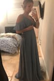 It's a beautiful dress but however it does run a little large in the cleavage area. I'm 4.5 months pregnant and even though it's a wrap dress I would need to get a button put on because it's too big. Length is a little long as well, but I did not try on with shoes. I love the sleeves though! Needed a dress for a wedding so not sure if I'll keep yet. - Alexis H.