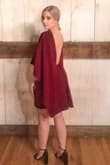 I LOVE this dress! I received so many compliments from both women and men. I had so much confidence wearing this. The fabric is thick and holds you in. It really makes anyone look great. The back is opened and very flattering. I can't wait to wear it again! - Maddy S.