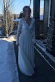 Wow, I do not have enough good words to say about this dress and Lulus. My now husband and I were engaged for only three months before we got married, so the time-frame on finding a dress was about as limited as it gets. I literally googled 'long sleeve, backless, white dress' as this was about what I was looking for (but really couldn't be too picky at that point) and thank goodness this dress popped up. It was more than perfect for what I was looking for, I couldn't believe it. Then there was the ordering process. The live chat on Lulus is so unbelievably helpful, I ordered the dress within about two days of seeing it. Then there is the return policy- absolutely amazing! I ended up ordered XS and S to ensure I got one that fit and ended up returning the S for a full refund. To top it off, the XS fit absolutely perfectly. No word of a lie, I did absolutely no modifications, not even hemming. I got sooo many compliments on the day of my wedding; not only did I love it but so did everybody else. The only weird thing is that the bottom doesn't steam or iron that well. I couldn't even see the few wrinkles though so it didn't matter to me. I absolutely loved the thicker lace up top, and I was able to move my arms all around to dance with my husband and give hugs. Man, I could go on forever. This dress is perfect and the price tag is out of this world. What a huge answer to prayer for my wedding!! Thank you Lulus!!!!!!!!!!!!!!!! - Shelby M.